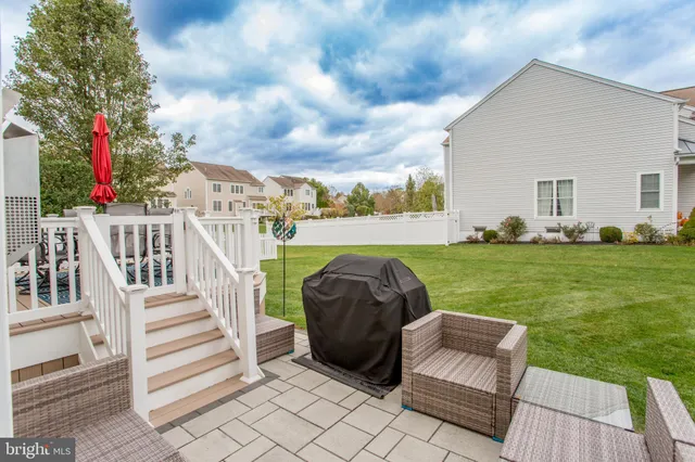 a front view of a house with backyard