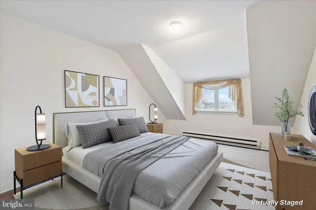 a bedroom with a bed and a lamp with window