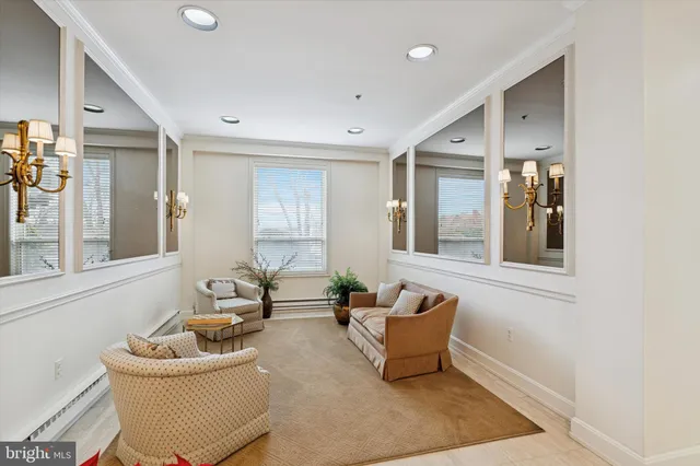 a living room with furniture and window