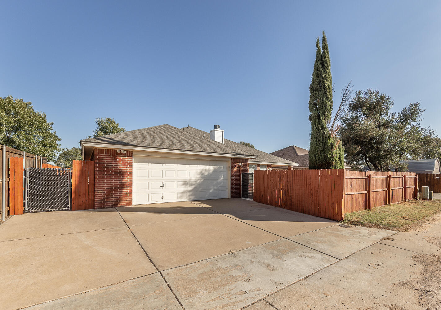 5815 89th Street Lubbock, TX 79424 - Photo 31 of 31 a view of a house with a yard