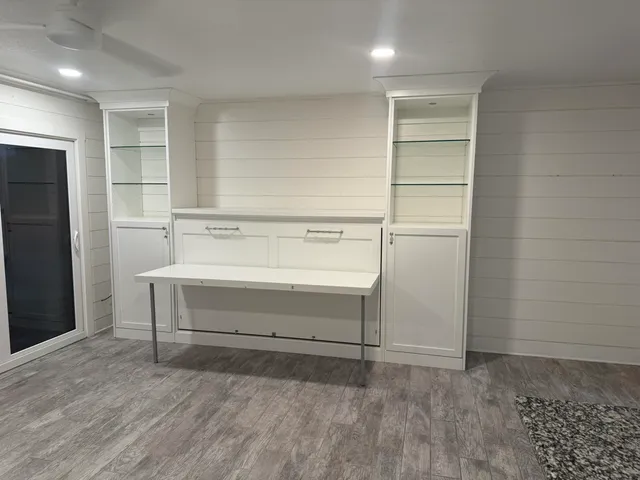 a view of an empty walk in closet