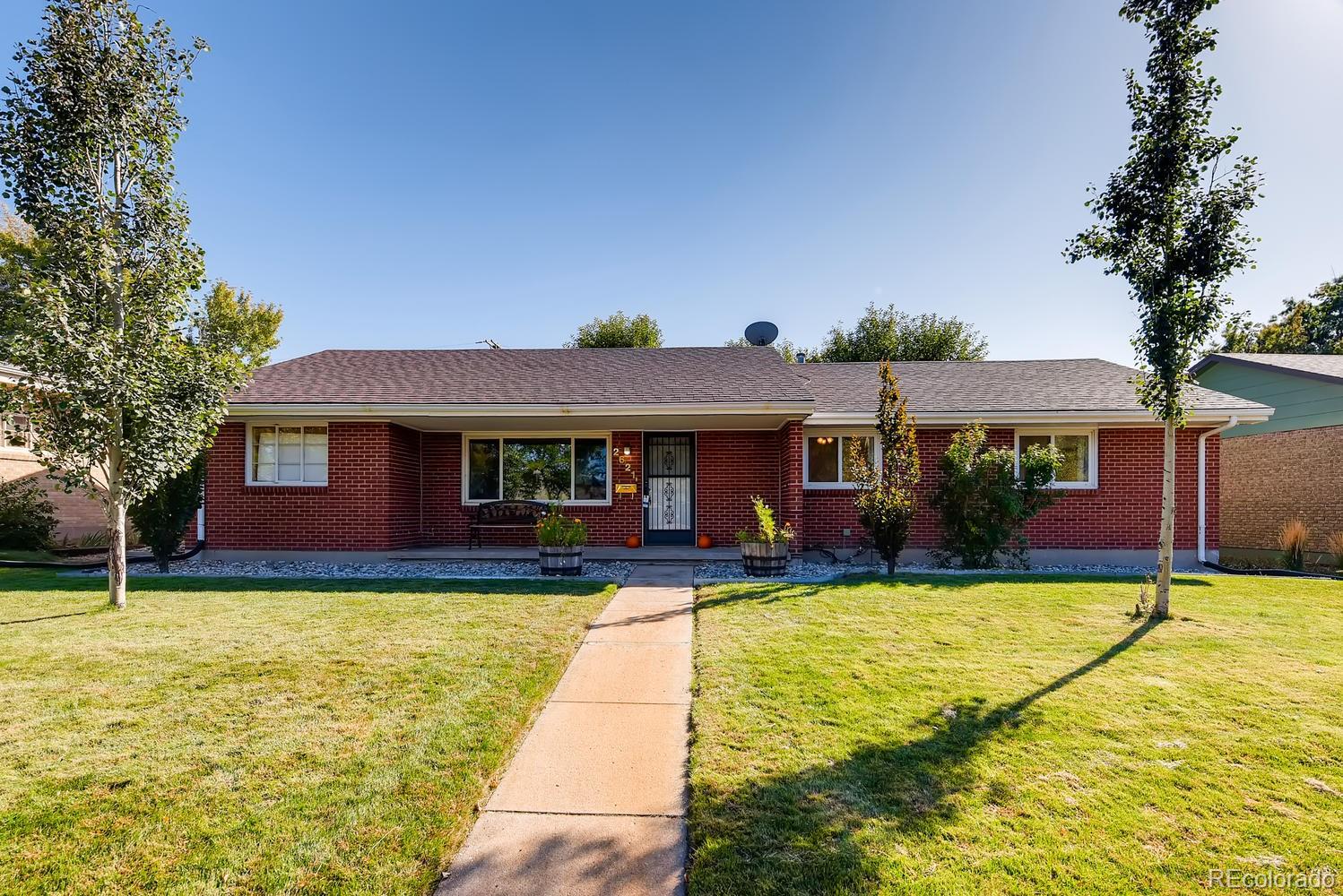 2621 Paseo Road Colorado Springs, CO 80907 - Photo 1 of 27 a view of a house with swimming pool and a yard