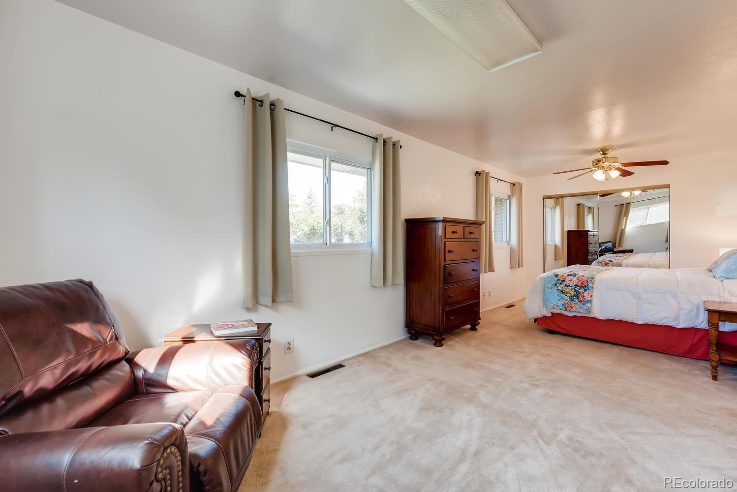 2621 Paseo Road Colorado Springs, CO 80907 - Photo 12 of 27 a bedroom with furniture and window