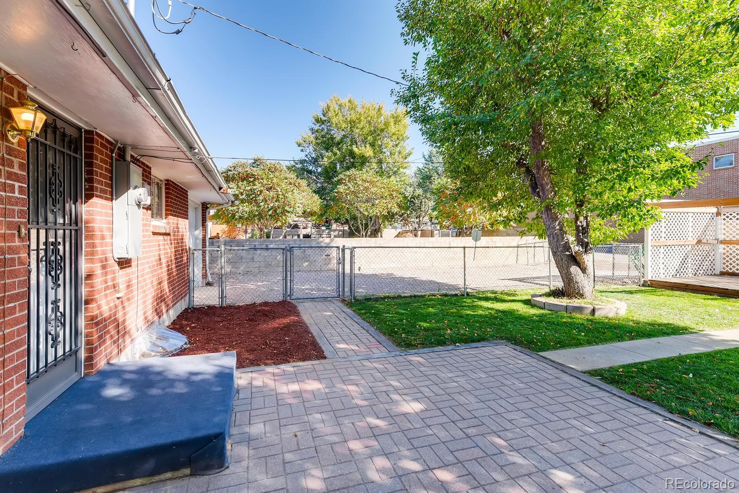 2621 Paseo Road Colorado Springs, CO 80907 - Photo 26 of 27 a view of backyard with green space