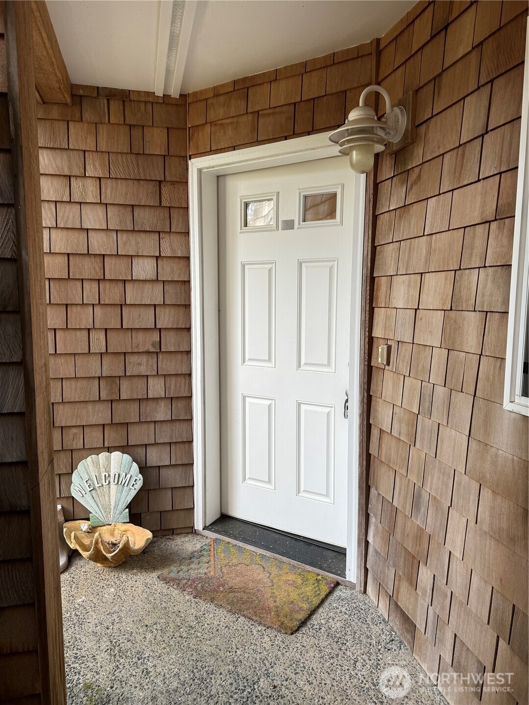 2815 Willows Road, Unit 116 Seaview, WA 98644 - Photo 2 of 30 a bathroom with a granite countertop shower and a sink