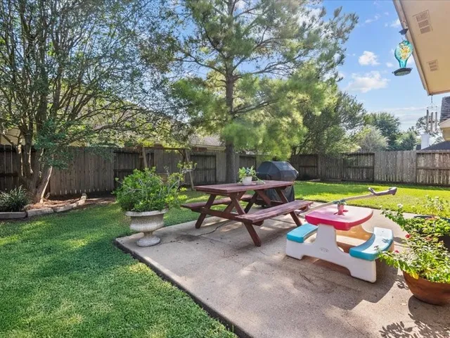 a house view with a garden space