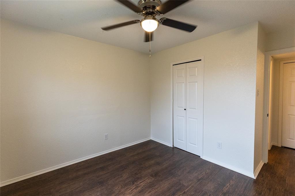 1031 East Peters Colony Road Carrollton, TX 75007 - Photo 15 of 21 wooden floor in an empty room