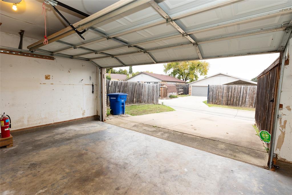 1031 East Peters Colony Road Carrollton, TX 75007 - Photo 17 of 21 a view of a backyard of a house