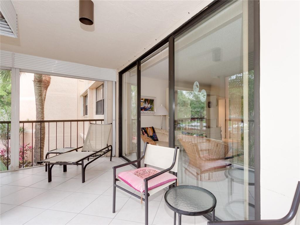 16401 Golf Club Road, Unit 210 Weston, FL 33326 - Photo 3 of 33 Balcony access from living area