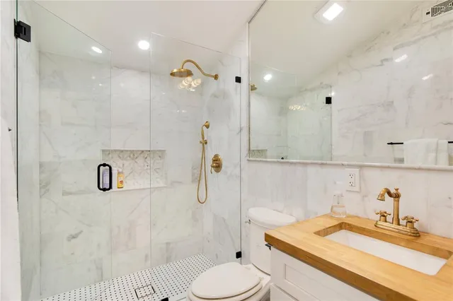 a room with a large window and couch