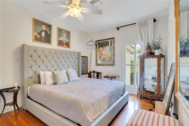 a view of a patio with a table and chairs