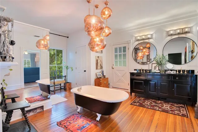 a view of a house with swimming pool and sitting area