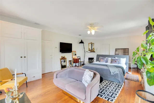 an aerial view of residential houses with outdoor space and river