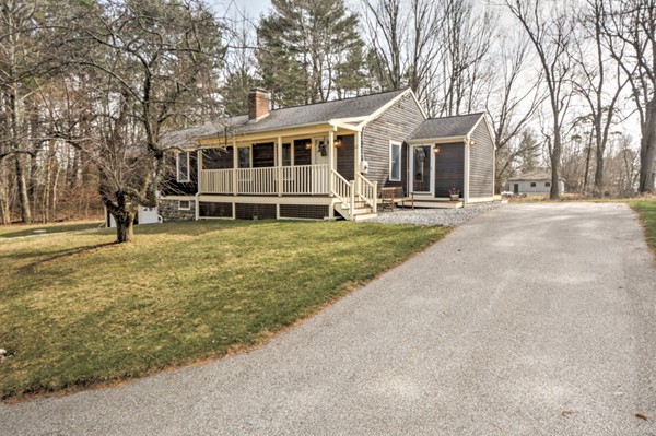 12 Williams Road Sturbridge, MA 01566 - Photo 2 of 30 a view of a house with a yard and large trees