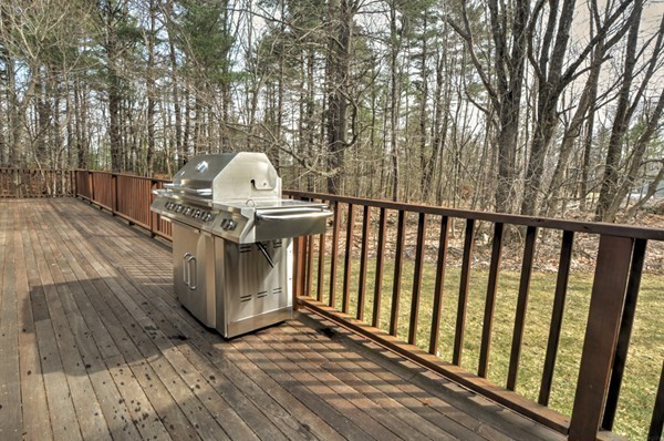 12 Williams Road Sturbridge, MA 01566 - Photo 24 of 30 a view of a roof deck with wooden floor and fence