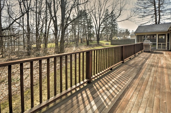 12 Williams Road Sturbridge, MA 01566 - Photo 25 of 30 a balcony with wooden floor and fence
