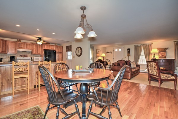 12 Williams Road Sturbridge, MA 01566 - Photo 7 of 30 a view of a dining room with furniture and wooden floor