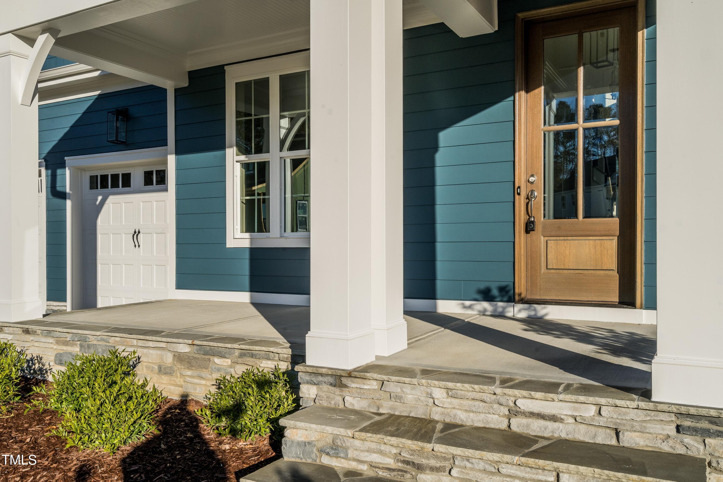 6031 Scalybark Road Durham, NC 27712 - Photo 2 of 29 002_Front Porch