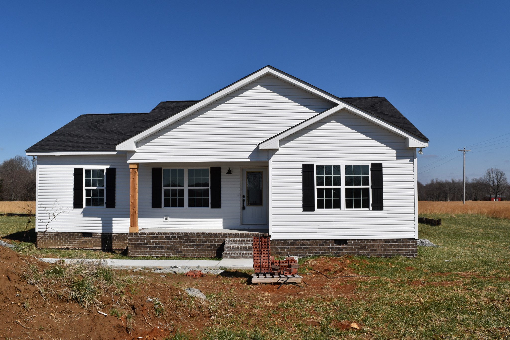 459 James Whitefield Road Bethpage, TN 37022 - Photo 1 of 16 a front view of a house with a yard