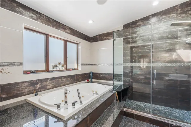 a bedroom with furniture and wooden floor