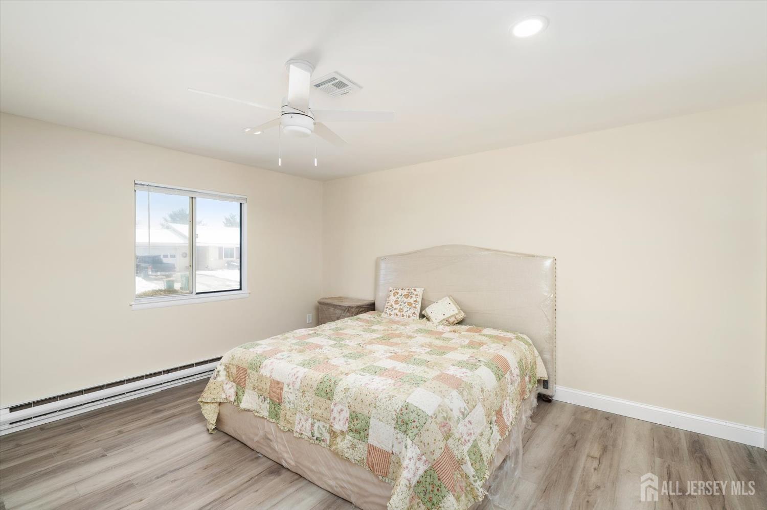 769A Marlton Road, Unit B Monroe Township, NJ 08831 - Photo 17 of 24 a bedroom with a bed and a window