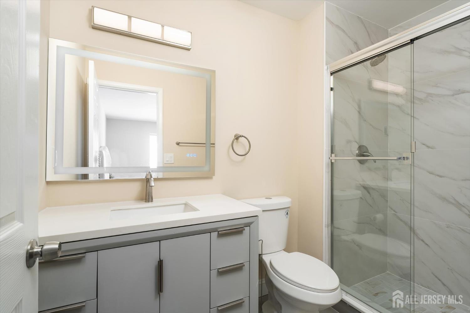 769A Marlton Road, Unit B Monroe Township, NJ 08831 - Photo 20 of 24 a bathroom with a sink a toilet and shower