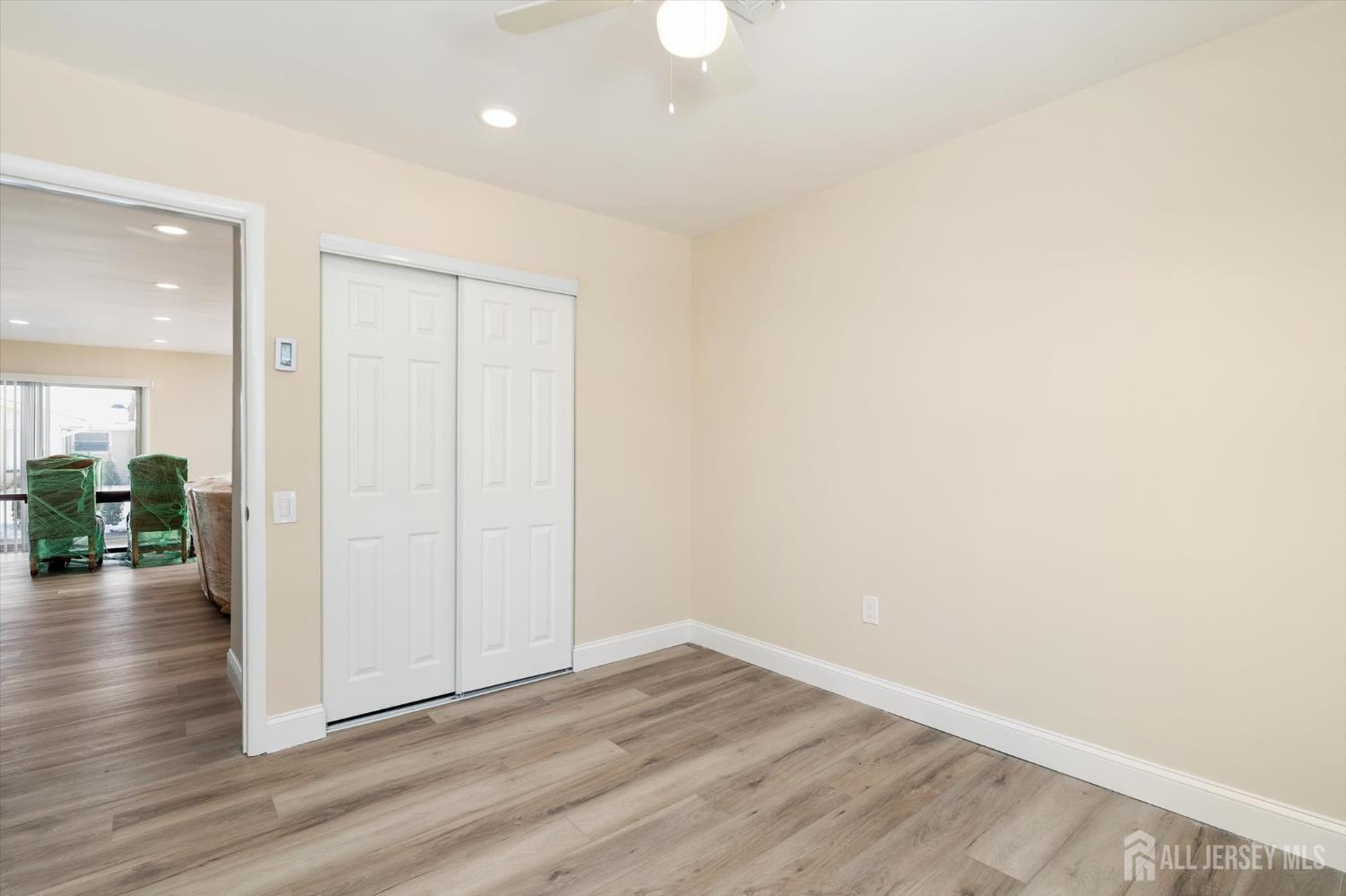 769A Marlton Road, Unit B Monroe Township, NJ 08831 - Photo 22 of 24 wooden floor in an empty room