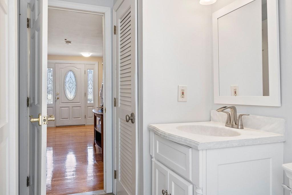 1 Fairview Drive Westford, MA 01886 - Photo 18 of 42 a bathroom with a sink a mirror and a shower