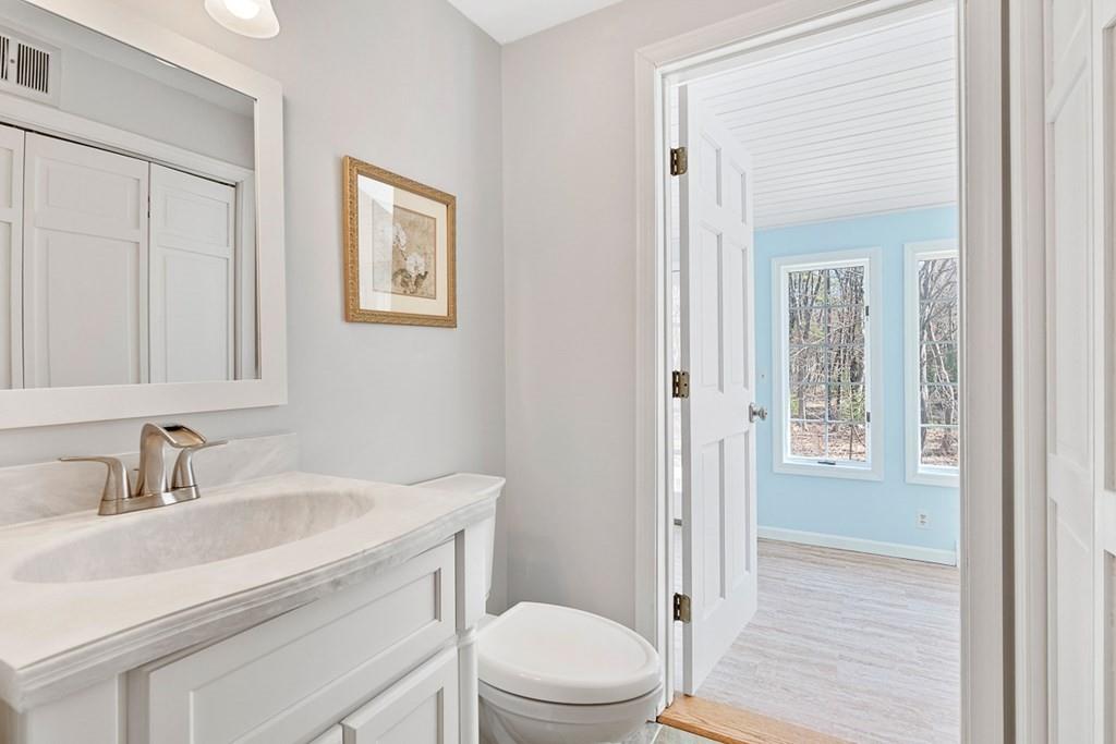 1 Fairview Drive Westford, MA 01886 - Photo 19 of 42 a bathroom with a sink a toilet and shower
