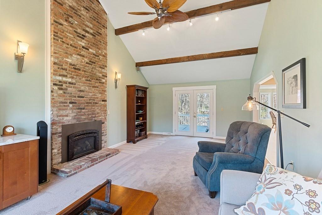 1 Fairview Drive Westford, MA 01886 - Photo 21 of 42 a living room with furniture and a fireplace