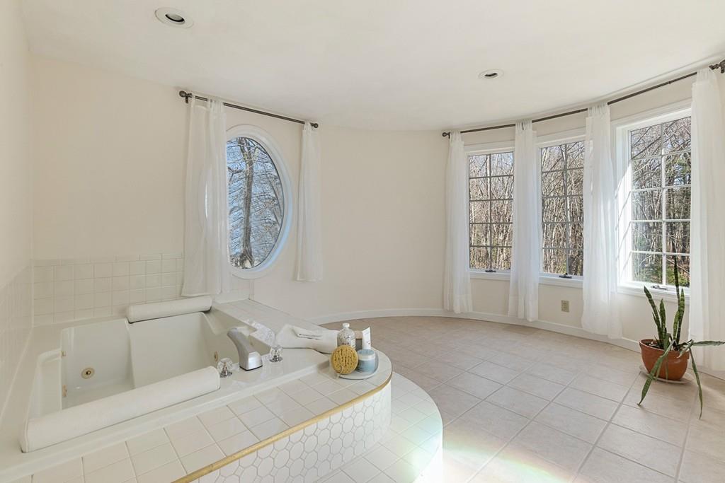 1 Fairview Drive Westford, MA 01886 - Photo 26 of 42 a bathroom with a tub sink and mirror