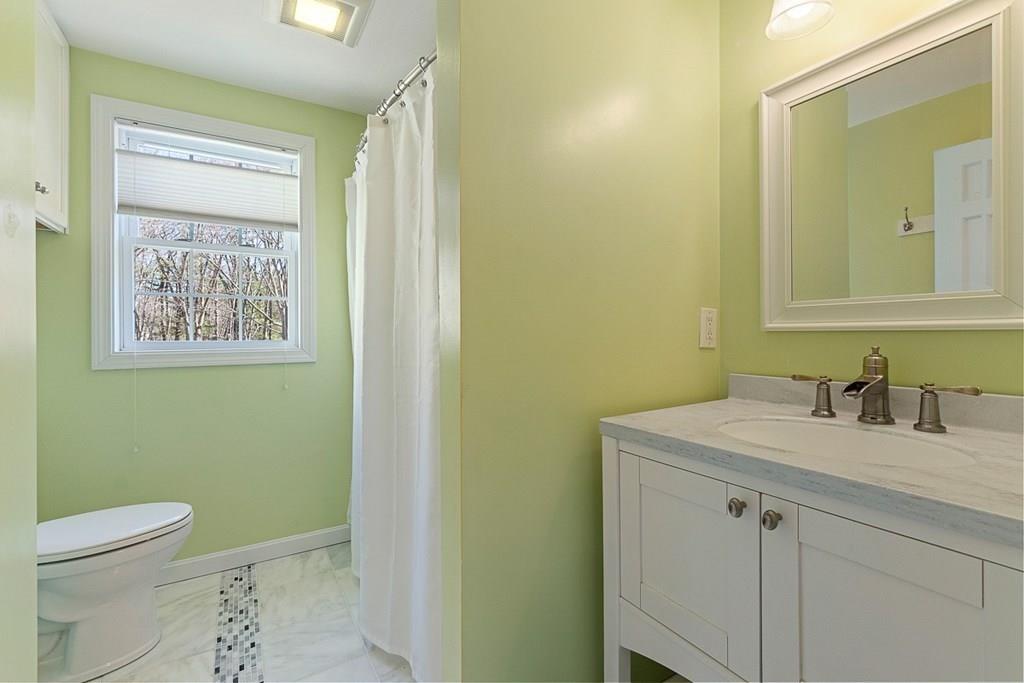 1 Fairview Drive Westford, MA 01886 - Photo 31 of 42 a bathroom with a granite countertop sink toilet and shower
