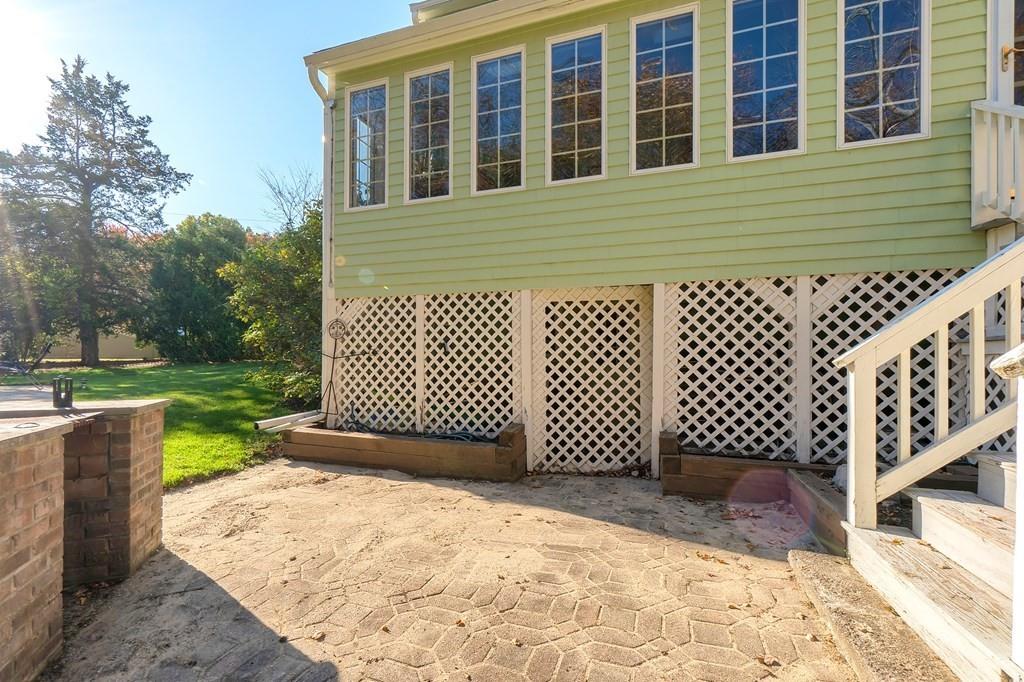 1 Fairview Drive Westford, MA 01886 - Photo 41 of 42 a backyard of a house with a swing