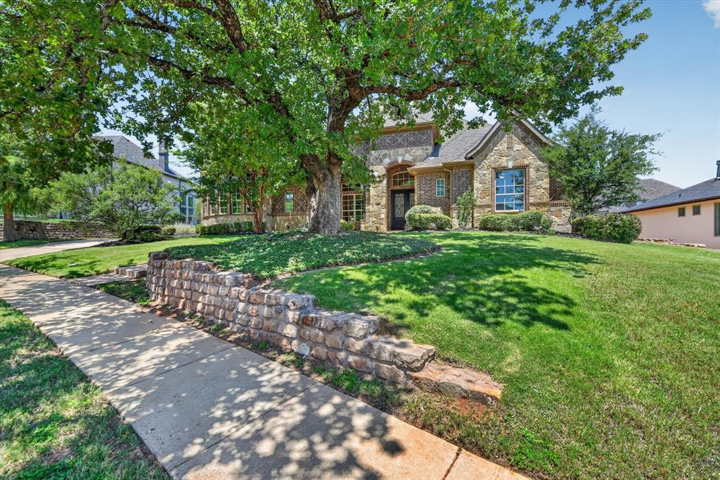 861 Hayden Road Lantana, TX 76226 - Photo 4 of 40 This remarkable residence features 4 bedrooms, each with its own ensuite bathroom, as well as two half baths for guests.
