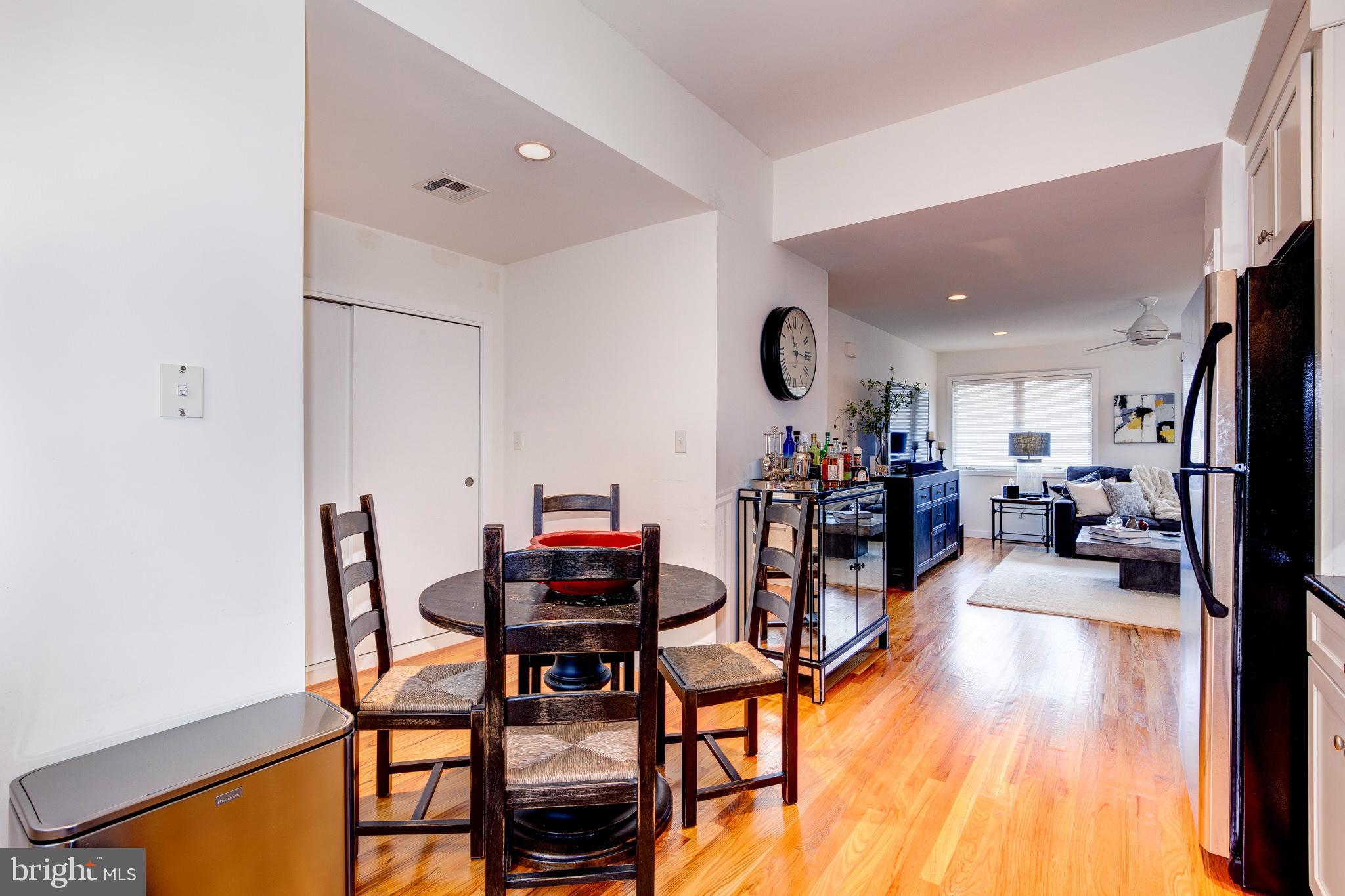 387 A Riverside Drive Princeton, NJ 08540 - Photo 13 of 23 a living room with furniture and a wooden floor
