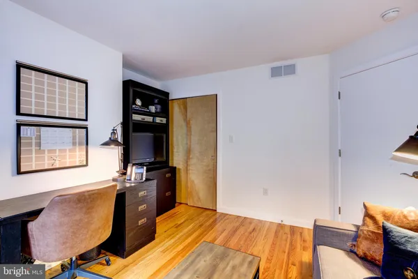 a bed room with a bed furniture and a window