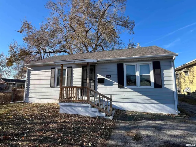a front view of a house with a porch