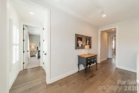 a view of a livingroom with furniture and a window