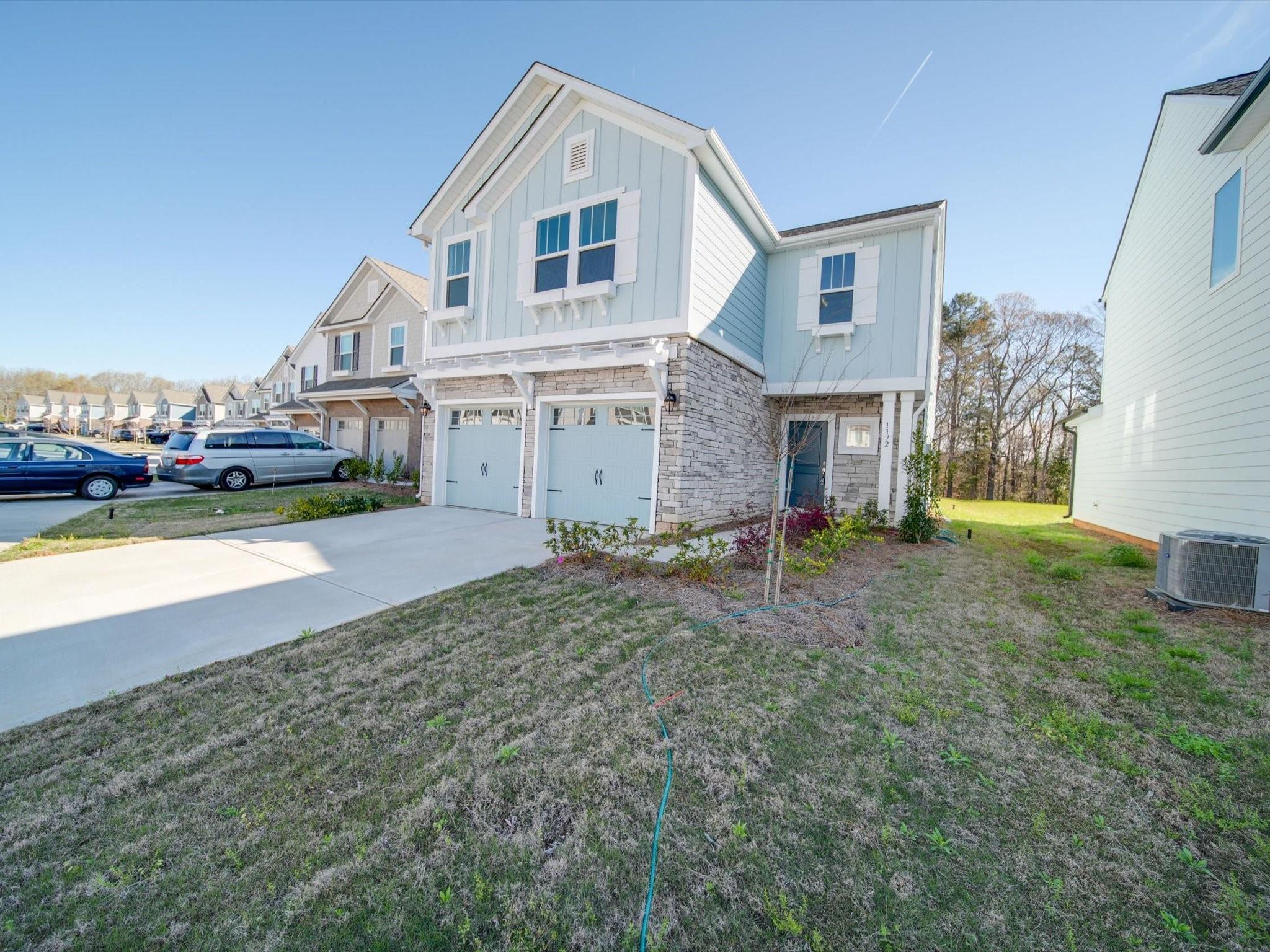 1172 Scotch Meadows Loop Monroe, NC 28110 - Photo 2 of 44 a view of a house with a yard