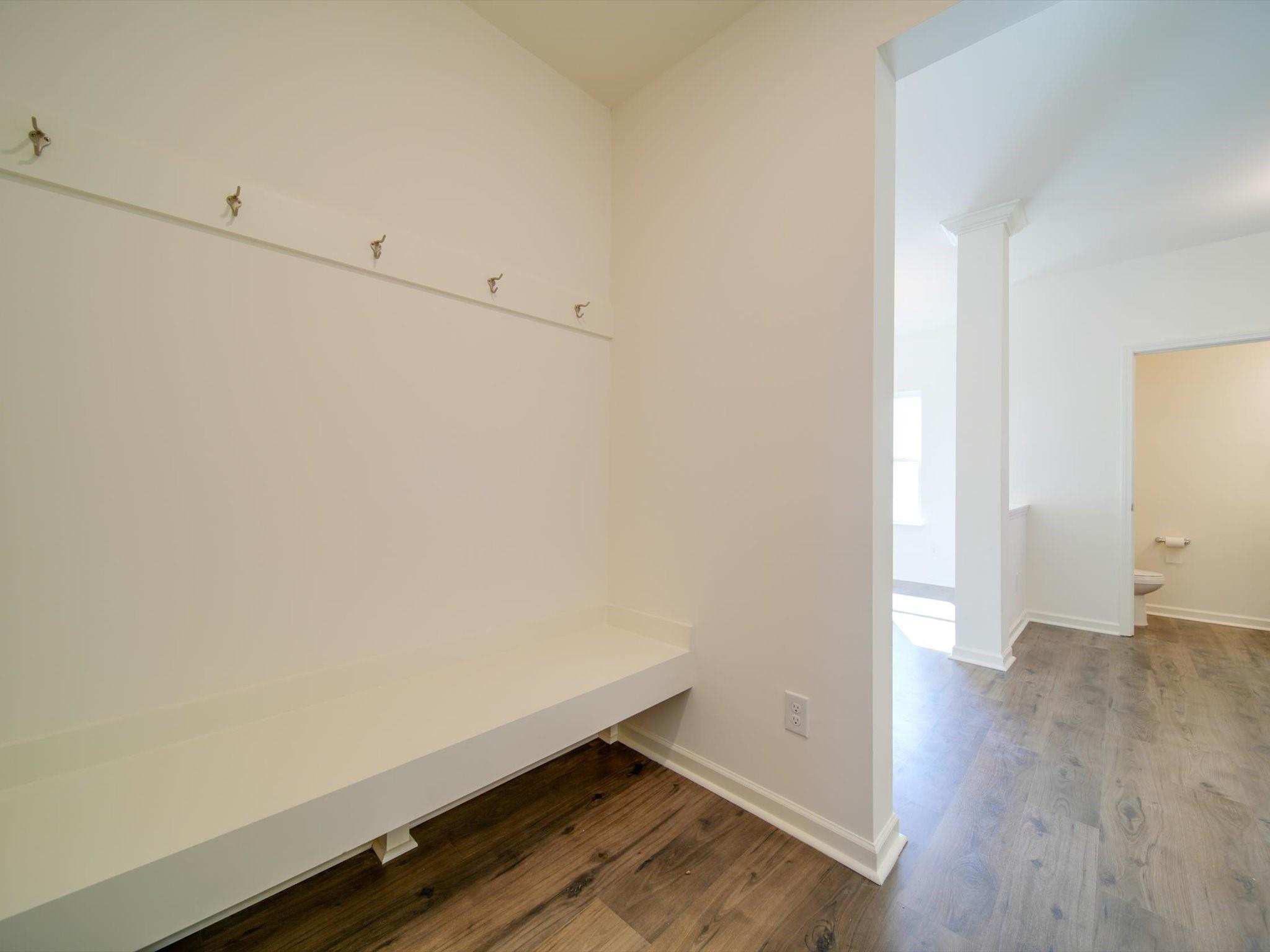 1172 Scotch Meadows Loop Monroe, NC 28110 - Photo 24 of 44 an empty room with wooden floor