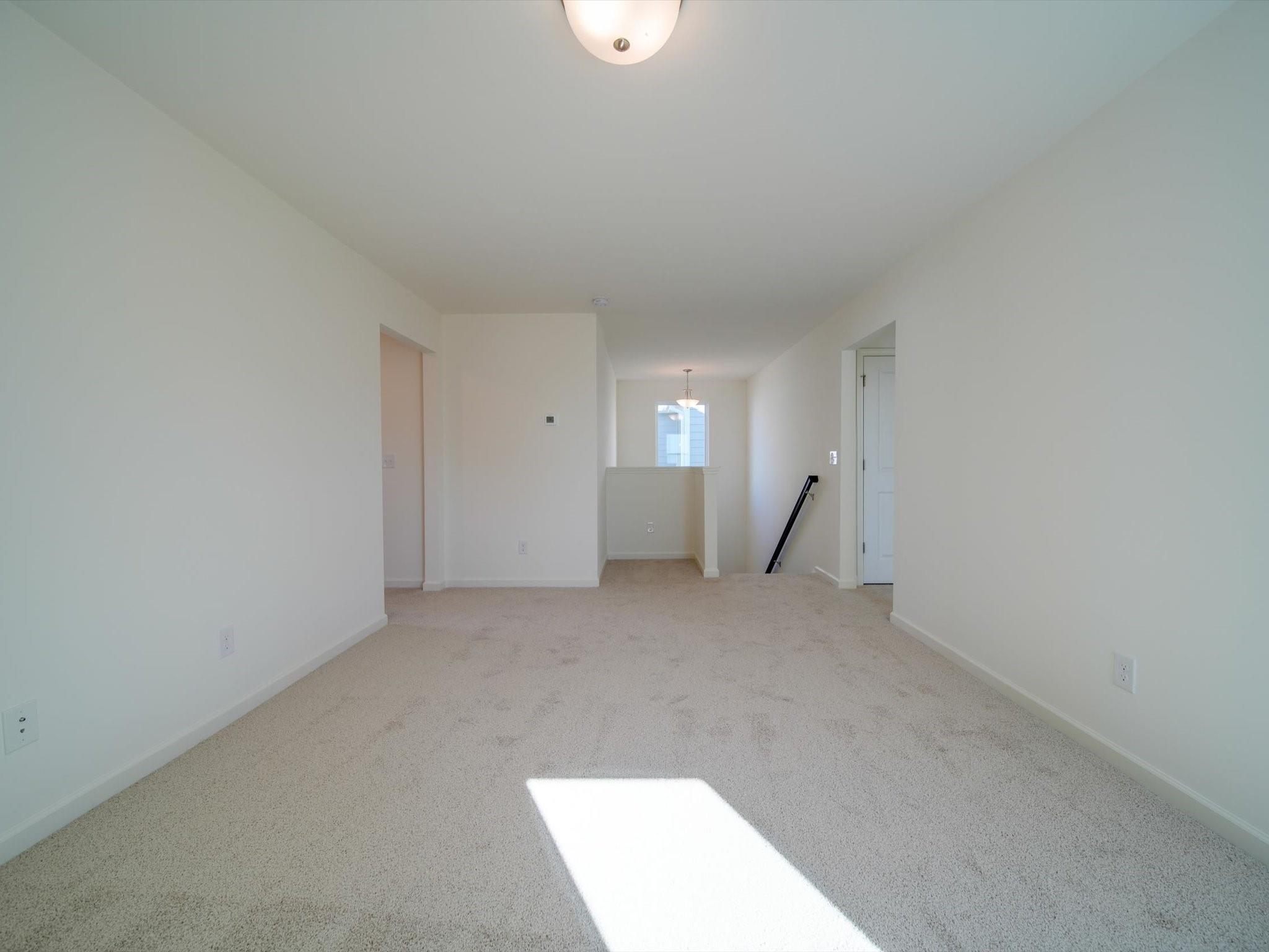 1172 Scotch Meadows Loop Monroe, NC 28110 - Photo 31 of 44 a view of an empty room with a window