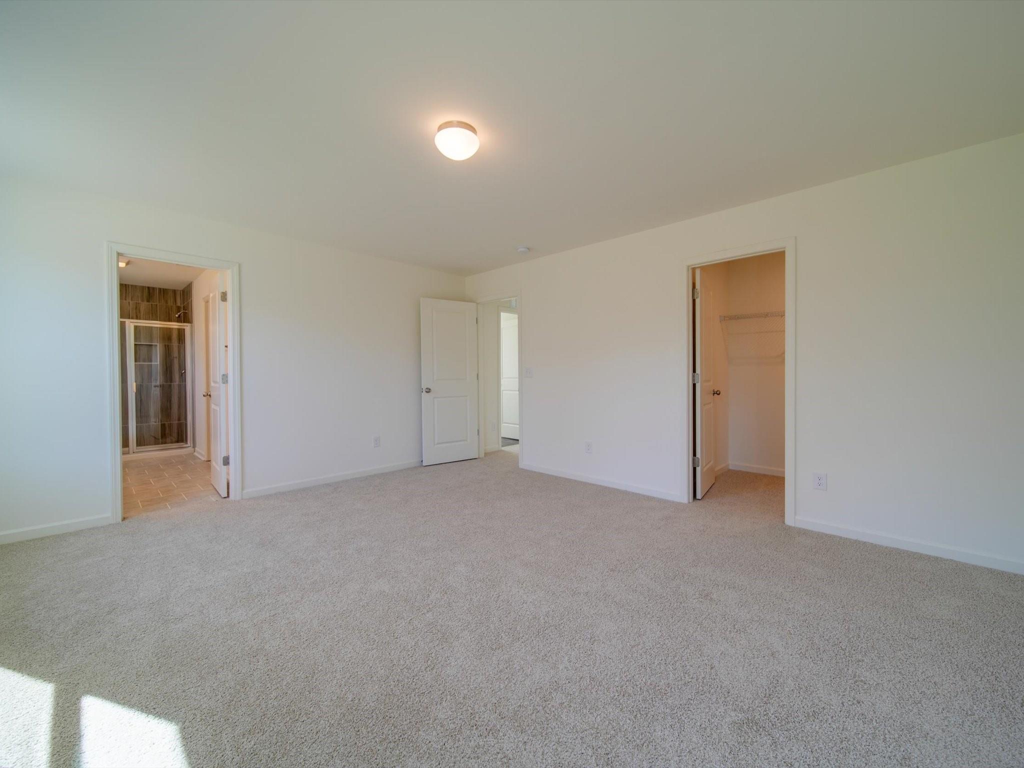 1172 Scotch Meadows Loop Monroe, NC 28110 - Photo 39 of 44 a view of an empty room and closet area