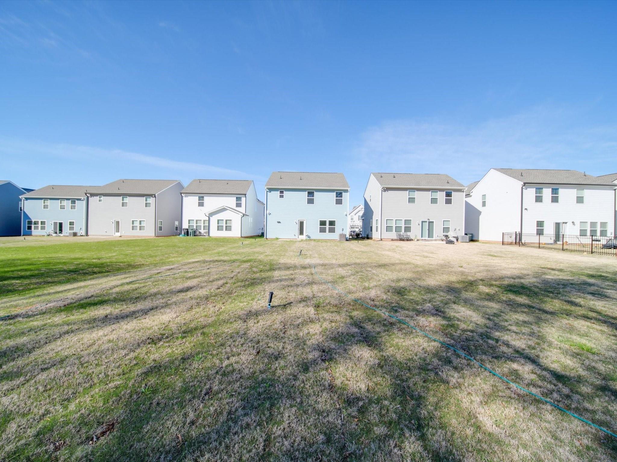1172 Scotch Meadows Loop Monroe, NC 28110 - Photo 42 of 44 a bedroom with a bed and a view of room