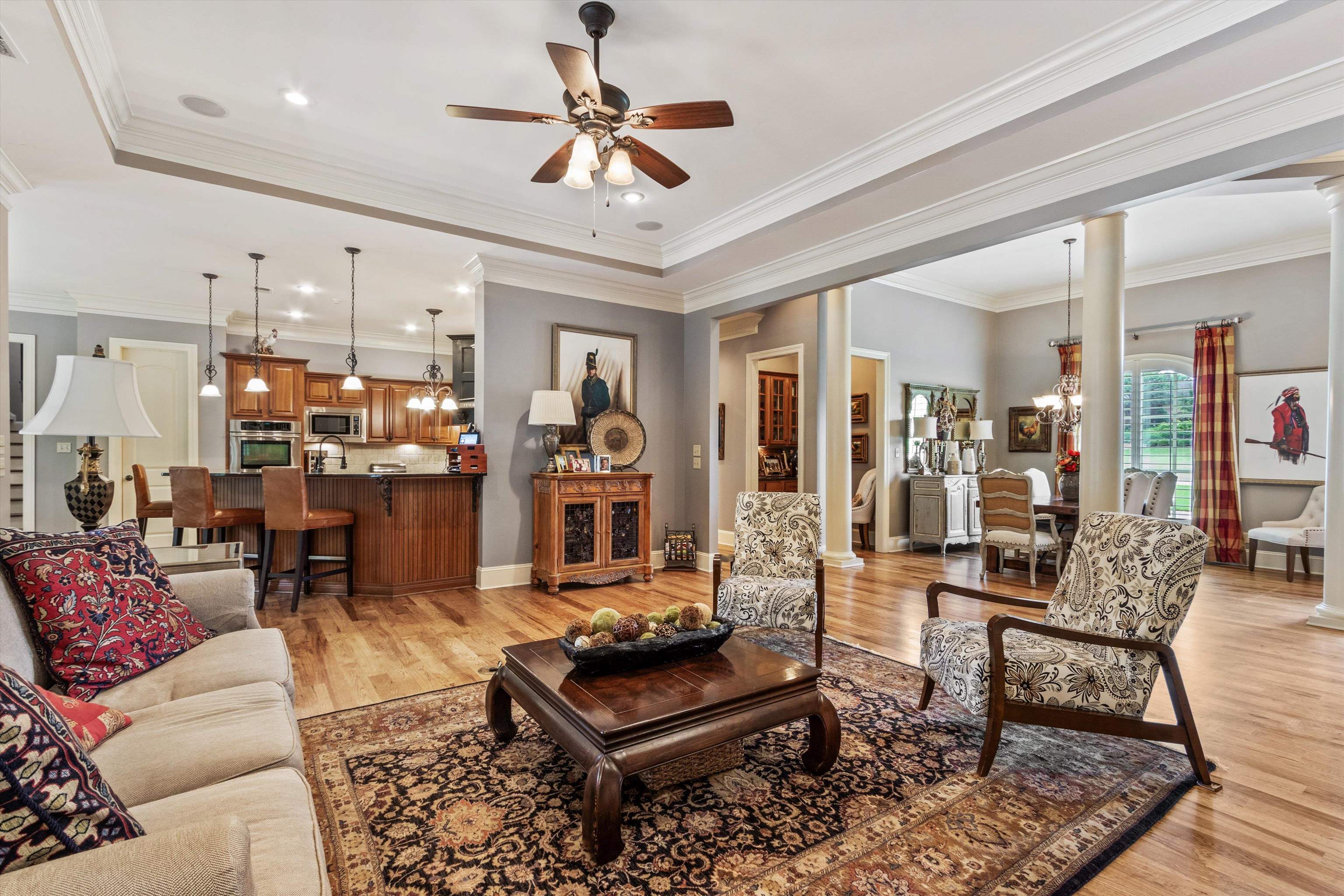 150 Ridgecrest Drive Arlington, TN 38002 - Photo 11 of 40 Open concept living space featuring wood-finish flooring, crown molding, and recessed lighting