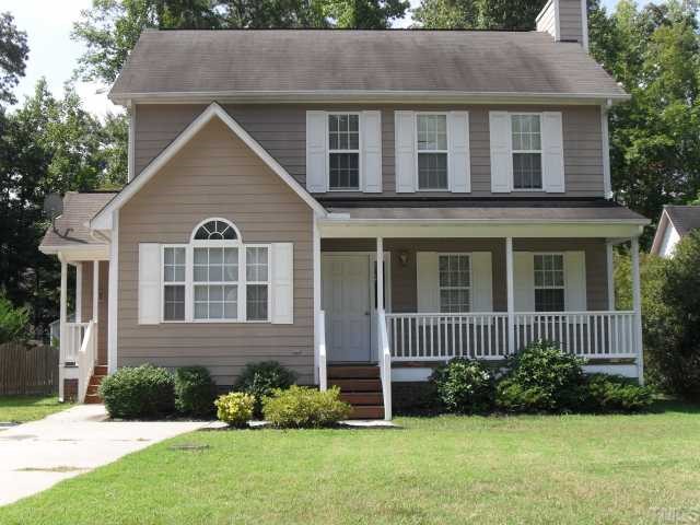 4 Round Spring Lane Durham, NC 27712 - Photo 1 of 10 Enjoy sitting on the covered front porch.