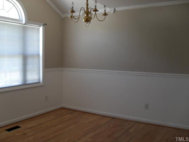 4 Round Spring Lane Durham, NC 27712 - Photo 4 of 10 Very large formal dining room with brand new hardwood floors. Great place to entertain or have a family gathering.