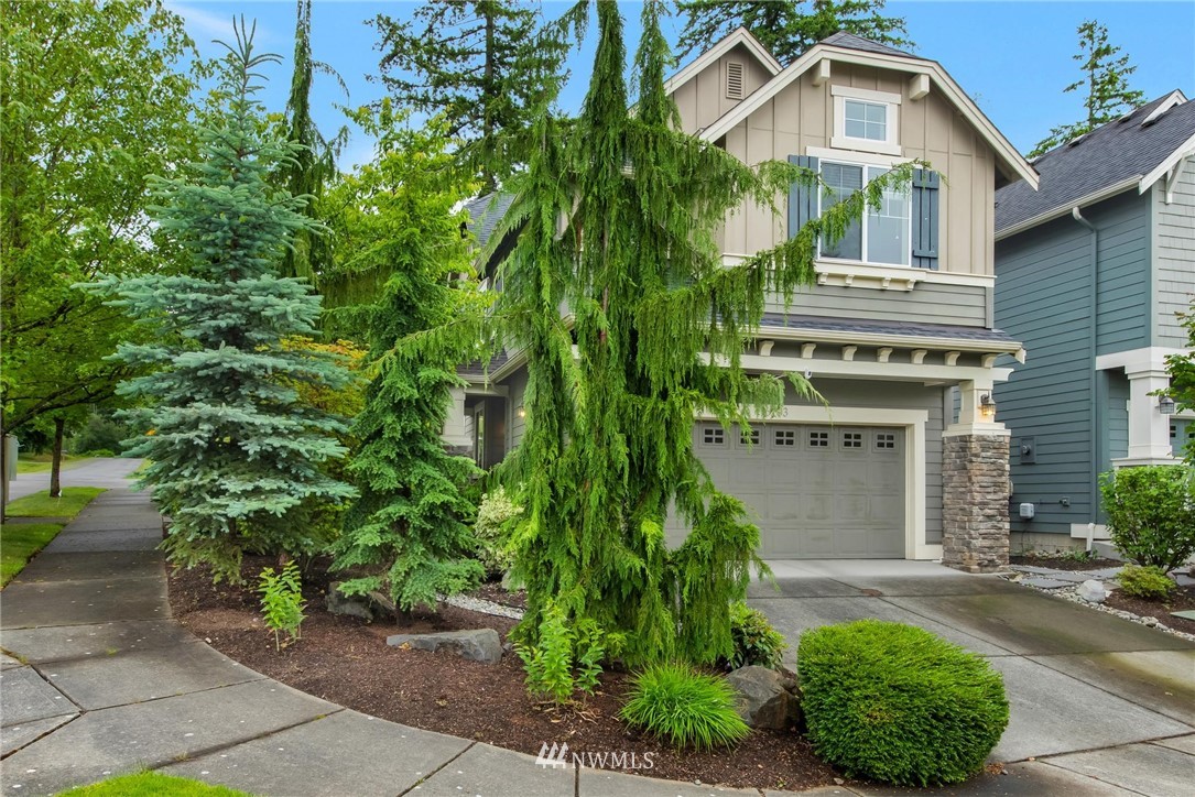 16203 41st Drive Southeast Bothell, WA 98012 - Photo 1 of 20 a front view of a house with a yard