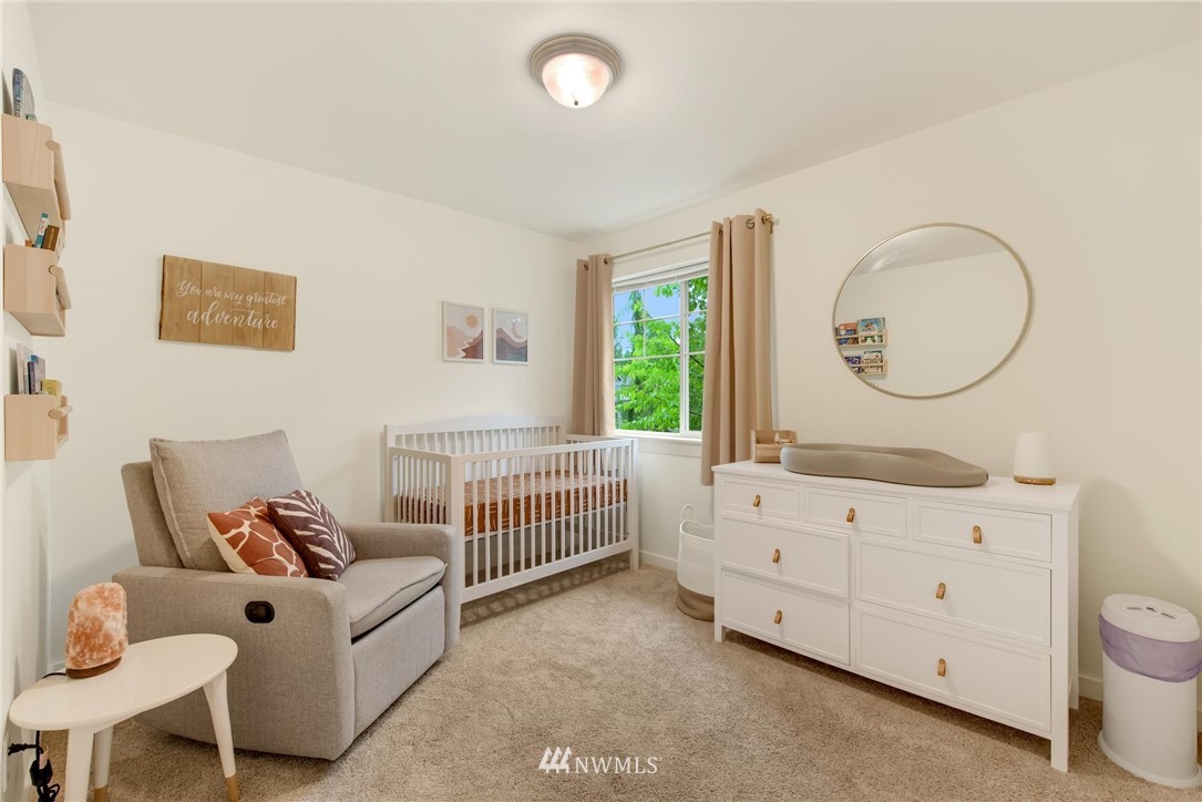 16203 41st Drive Southeast Bothell, WA 98012 - Photo 15 of 20 a living room with furniture and a window