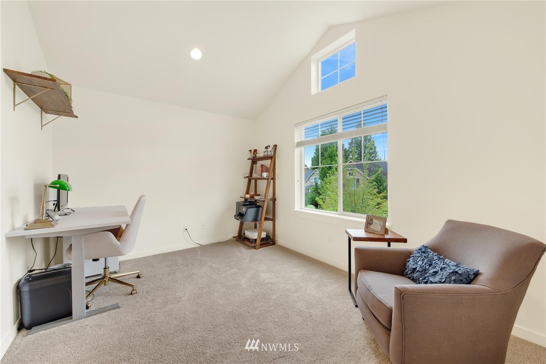 16203 41st Drive Southeast Bothell, WA 98012 - Photo 16 of 20 a living room with furniture and a window