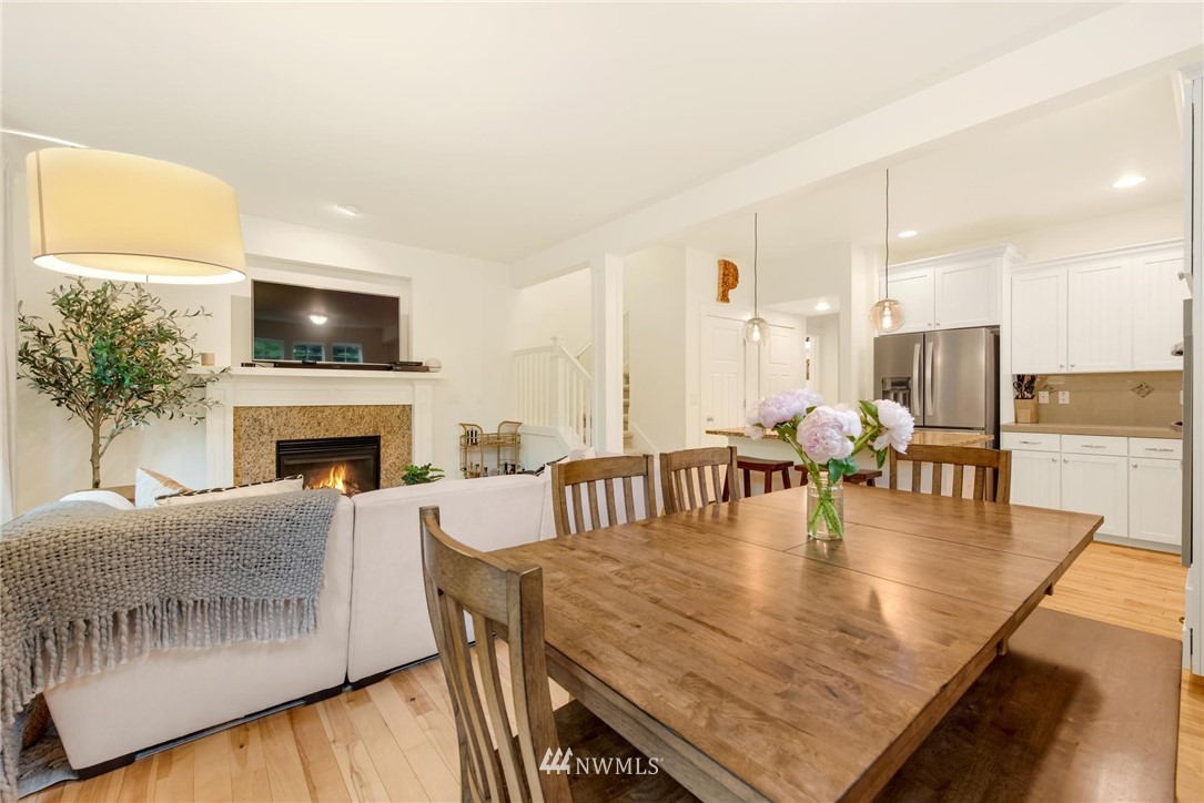16203 41st Drive Southeast Bothell, WA 98012 - Photo 7 of 20 a living room with fireplace furniture and a flat screen tv